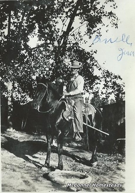 Uncle Jim horseback with shovel